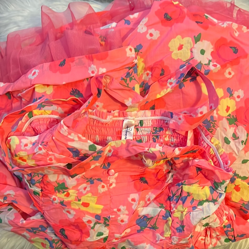 Youth dress with flowers, hot pink with tulle at the bottom.
